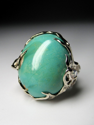 Turquoise gold ring with moonstones
